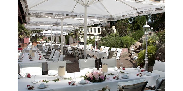 Destination-Wedding - Garten - Dekobeispiel Palmenterasse (gehört zum Rittersaal) - The Lakeside Burghotel zu Strausberg