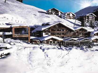 Destination-Wedding - Art der Location: Hotel / Chalet - Hotel-Außenansicht | Winter - My Alpenwelt Resort****Superior