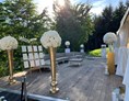 Hochzeitslocation: Terrassenansicht zum Garten - bellabianco