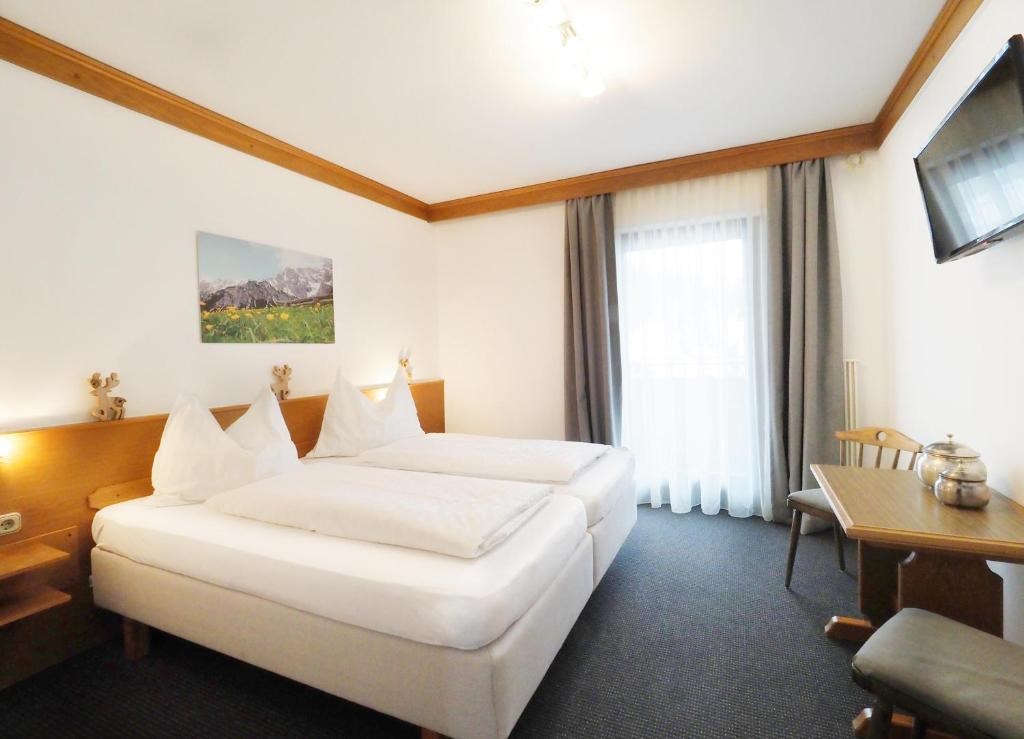 Aster's Mountainclub Zimmer / Suiten Pension Anni