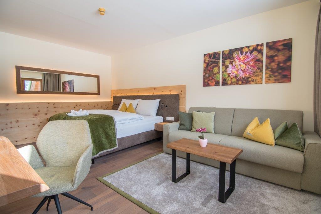 Seehotel Jägerwirt Zimmer / Suiten Seepanorama Familien Suite